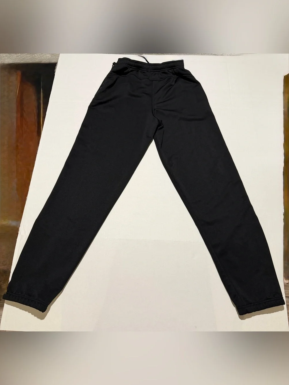 Nike Black Joggers with Yellow Side Stripe and Gold Swoosh